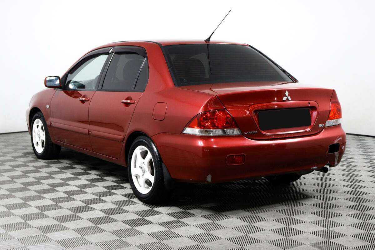 Купить Mitsubishi Lancer с пробегом. Фото: #6