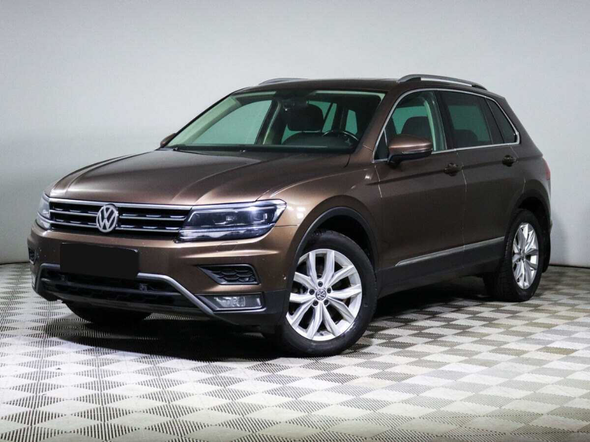 Купить Volkswagen Tiguan с пробегом. Посмотреть фото
