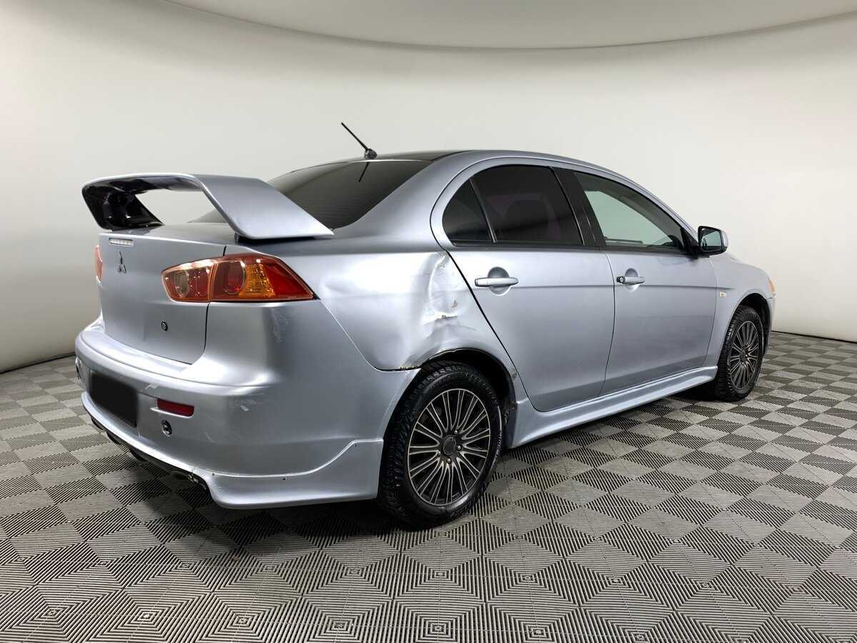 Купить Mitsubishi Lancer с пробегом. Фото: #4