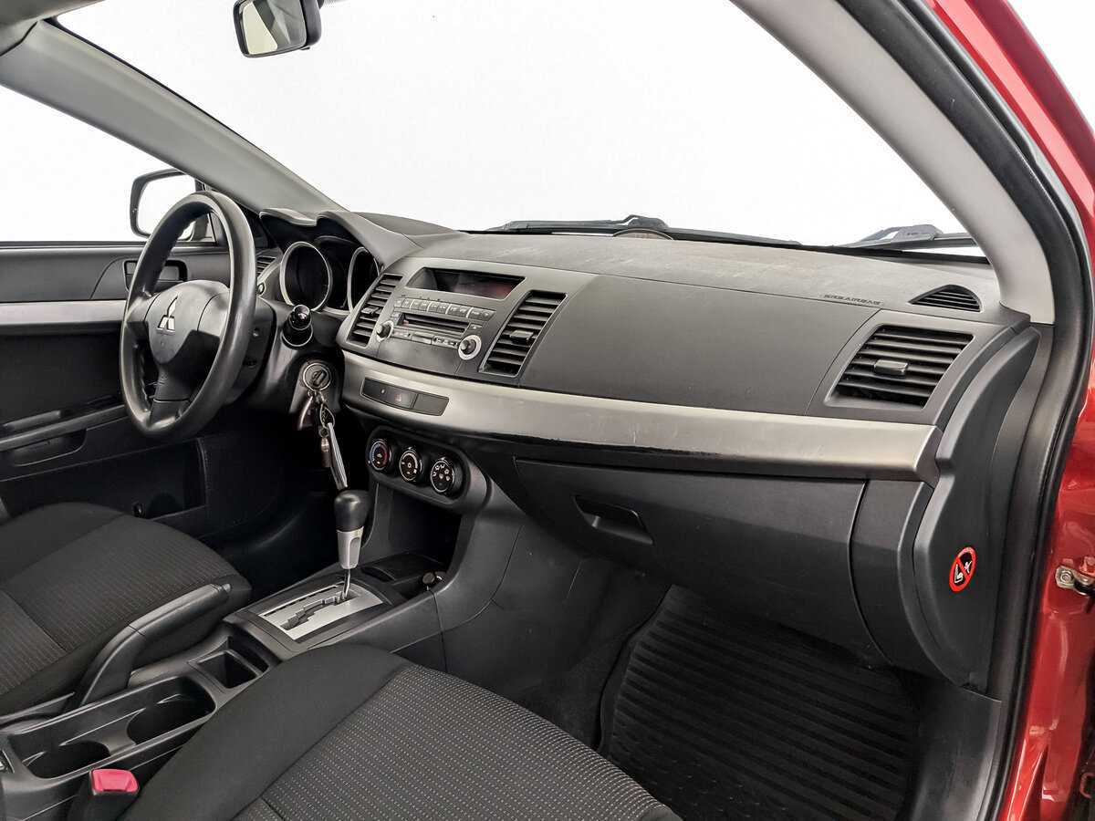 Купить Mitsubishi Lancer с пробегом. Фото: #9