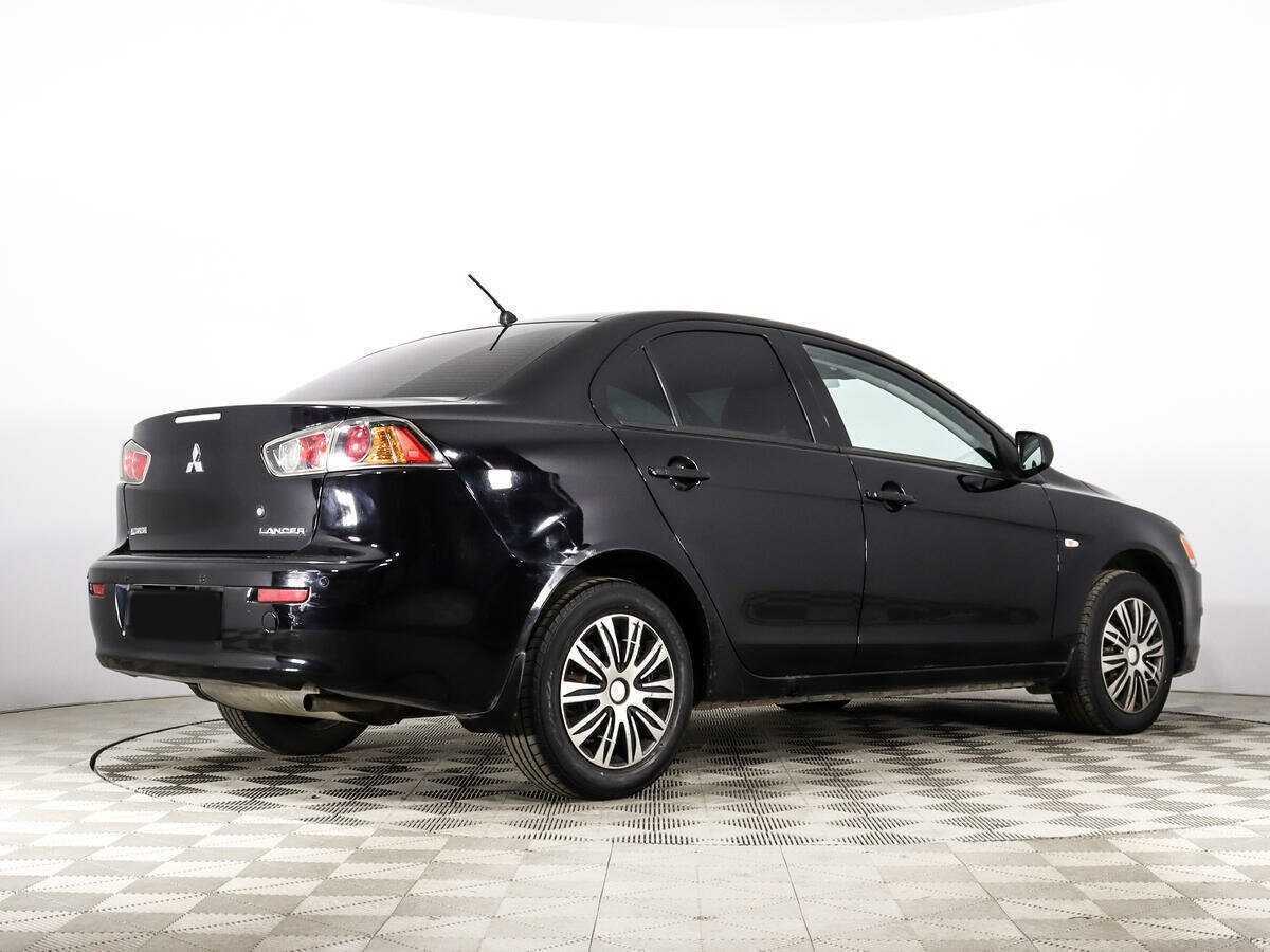 Купить Mitsubishi Lancer с пробегом. Фото: #4