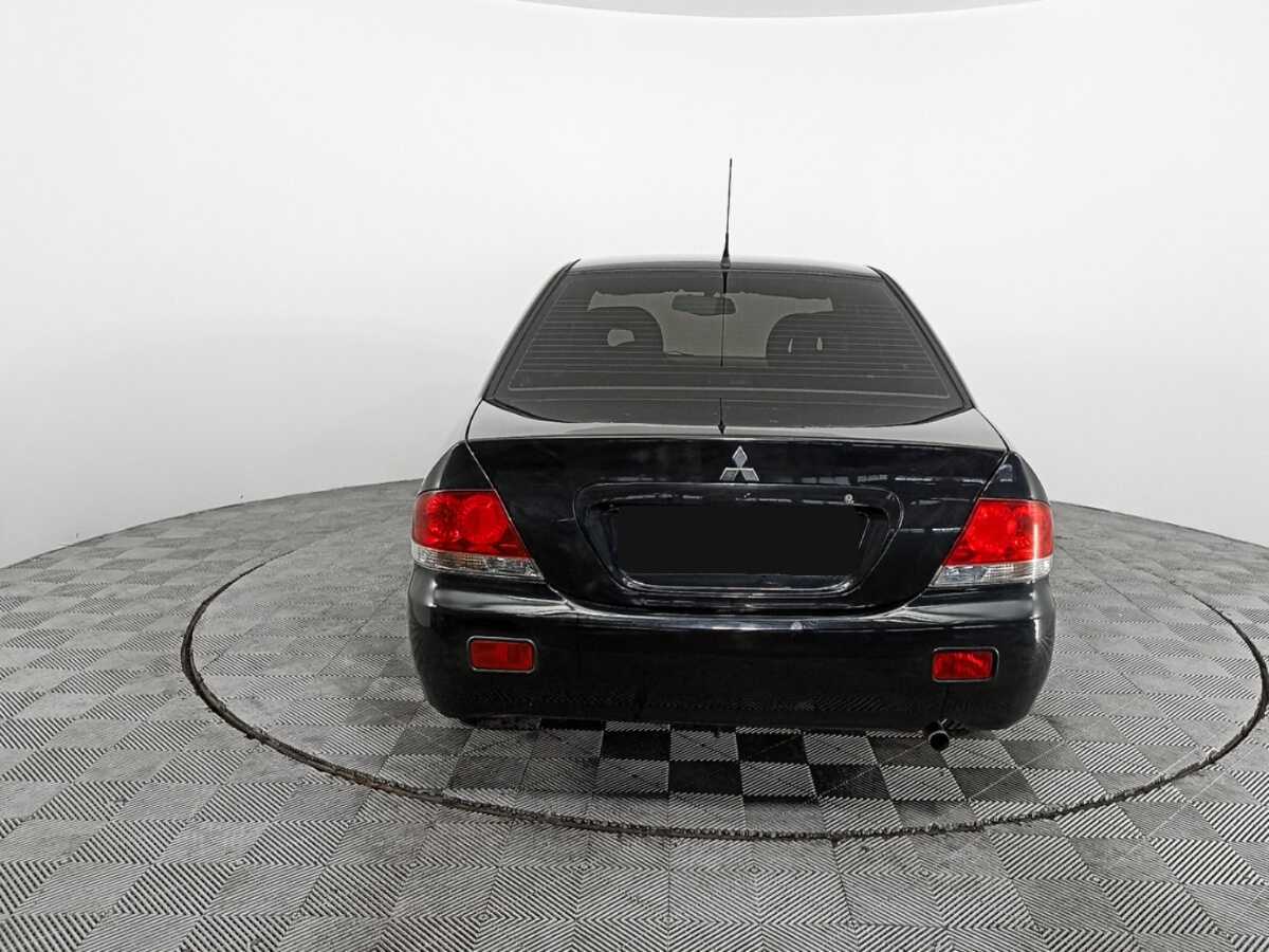 Купить Mitsubishi Lancer с пробегом. Фото: #4