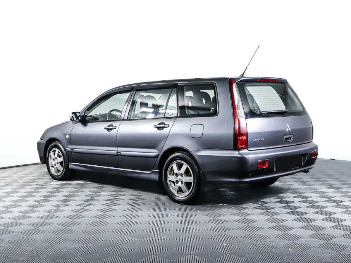 Купить Mitsubishi Lancer с пробегом. Фото: #6