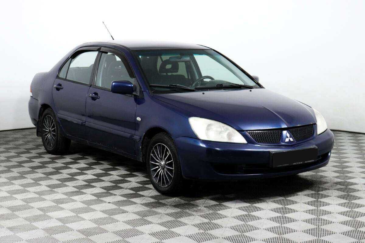 Купить Mitsubishi Lancer с пробегом. Фото: #2