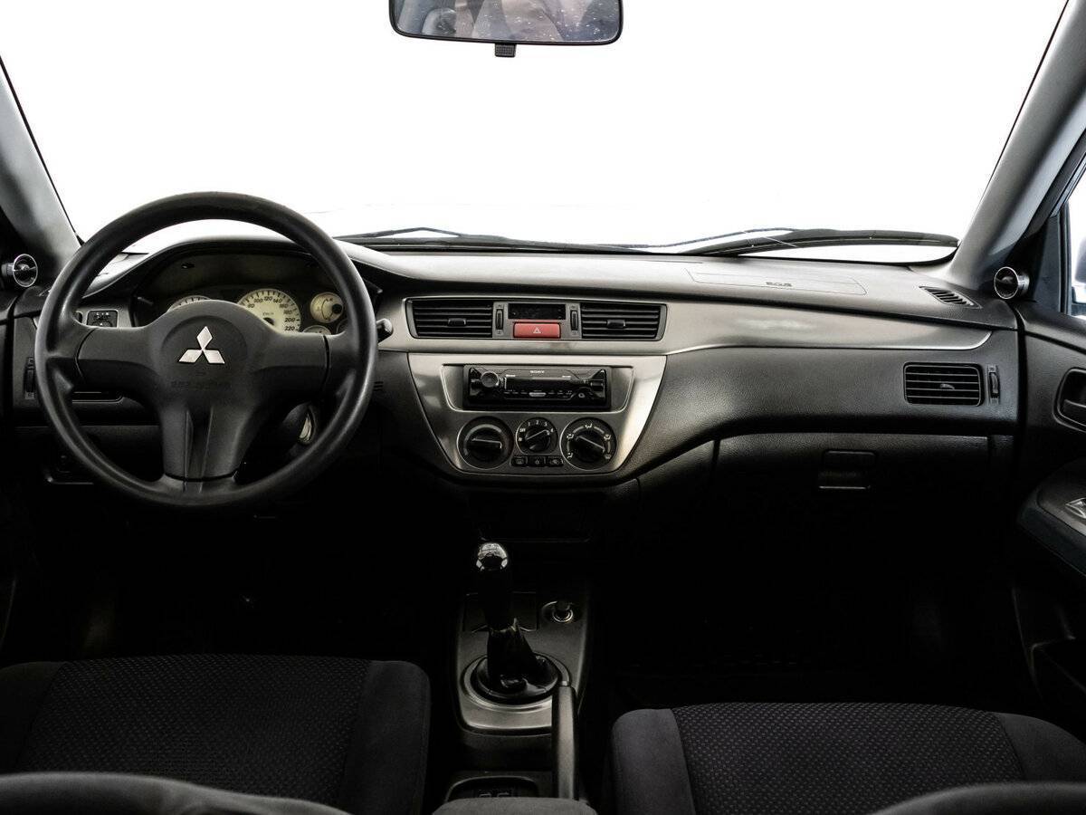 Купить Mitsubishi Lancer с пробегом. Фото: #10