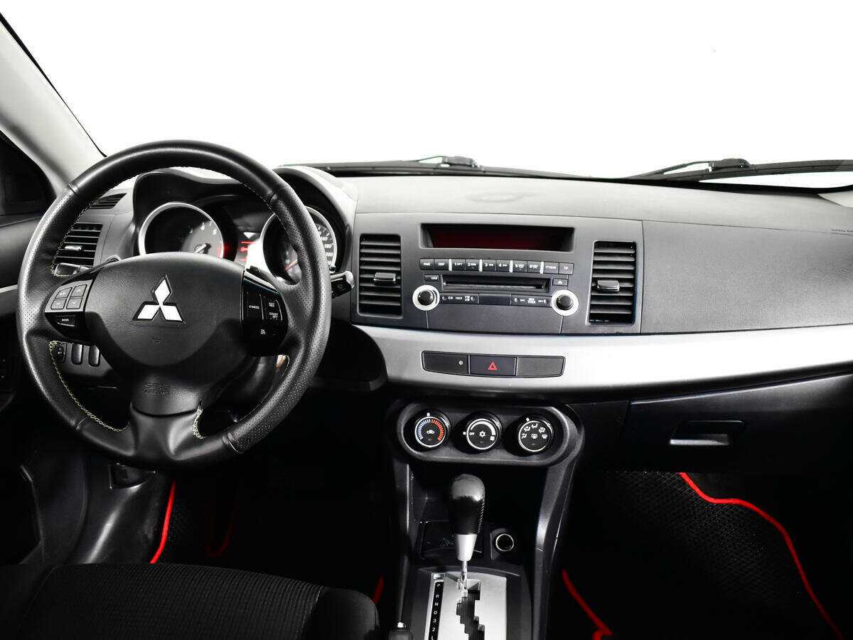 Купить Mitsubishi Lancer с пробегом. Фото: #8