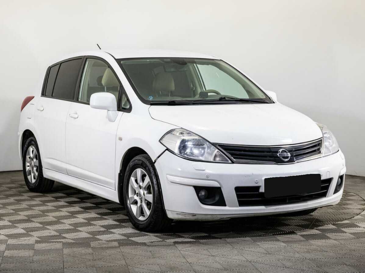 Купить Nissan Tiida с пробегом. Фото: #2