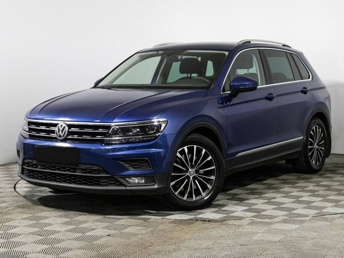 Купить Volkswagen Tiguan с пробегом. Посмотреть фото