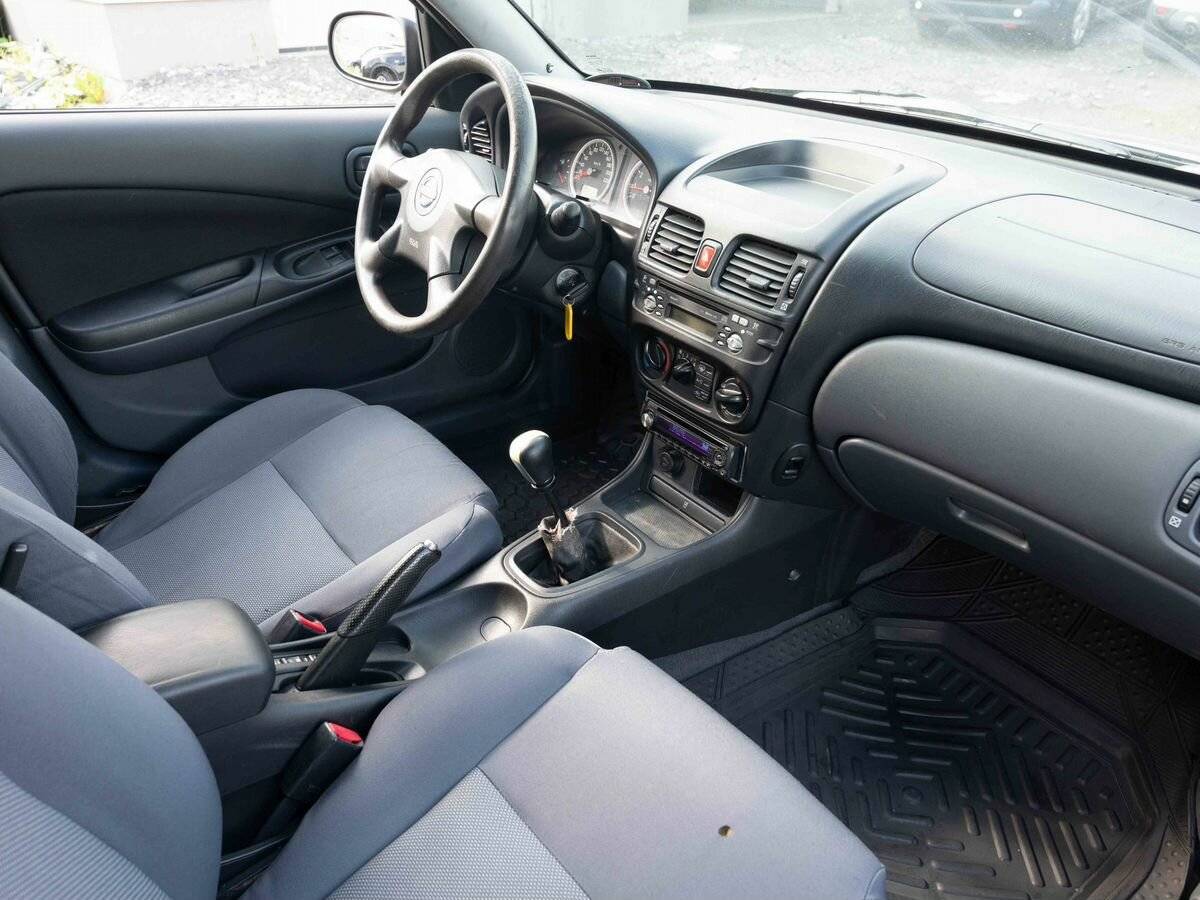 Купить Nissan Almera с пробегом. Фото: #10