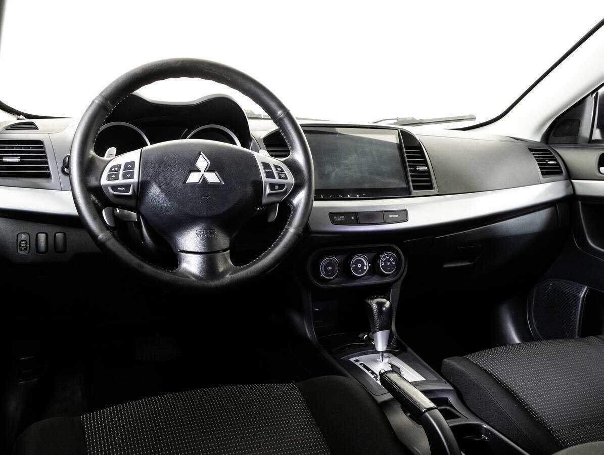 Купить Mitsubishi Lancer с пробегом. Фото: #10