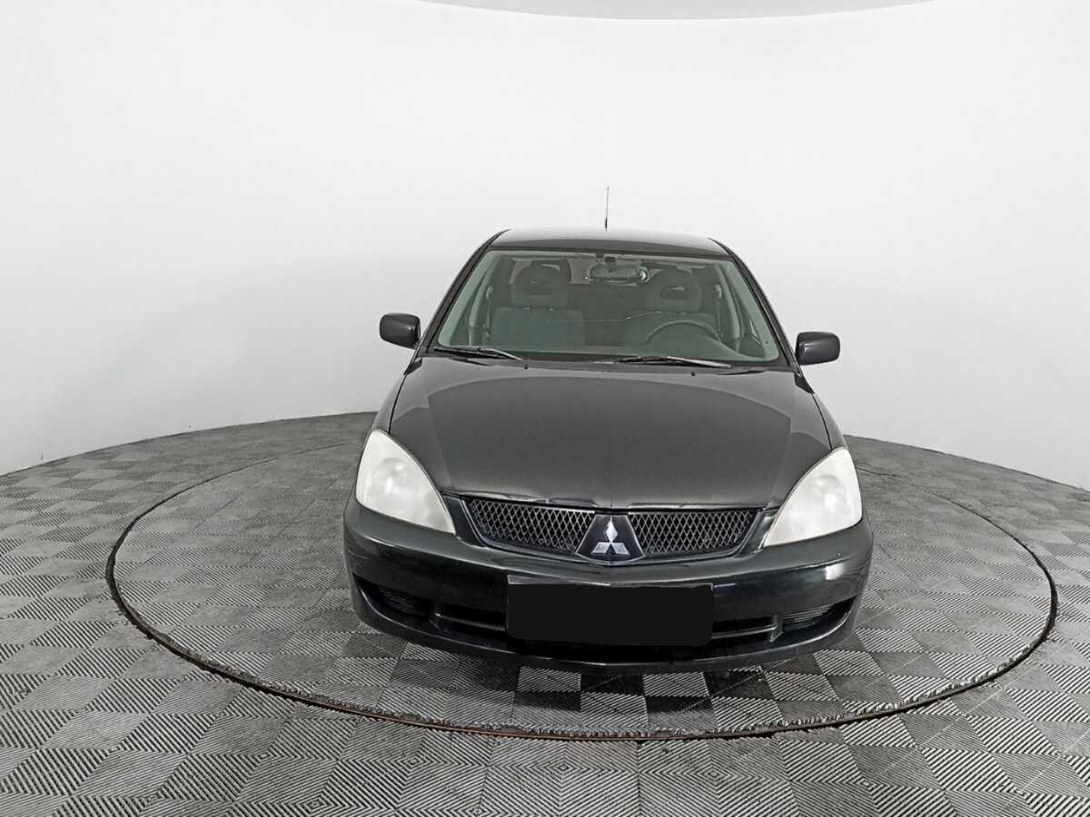 Купить Mitsubishi Lancer с пробегом. Фото: #1