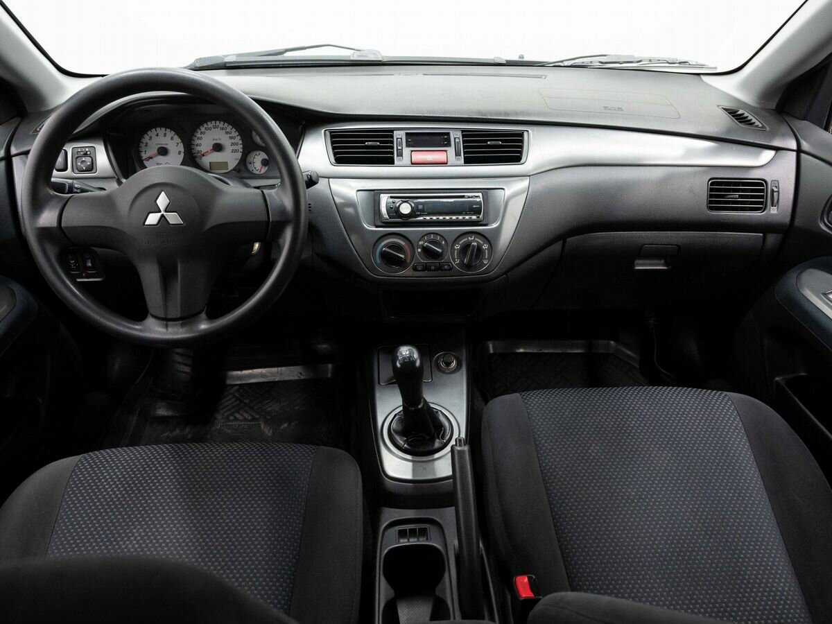 Купить Mitsubishi Lancer с пробегом. Фото: #11