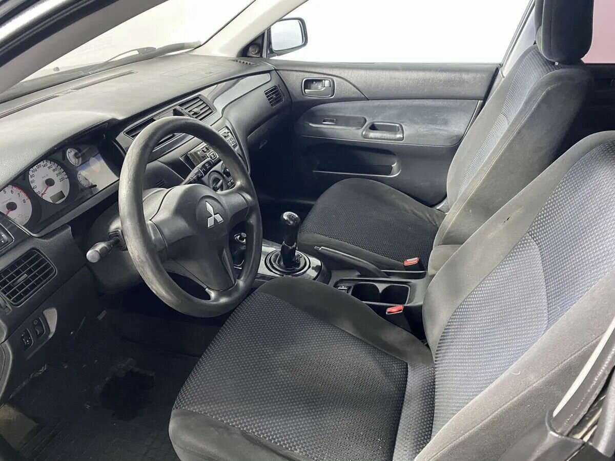 Купить Mitsubishi Lancer с пробегом. Фото: #7