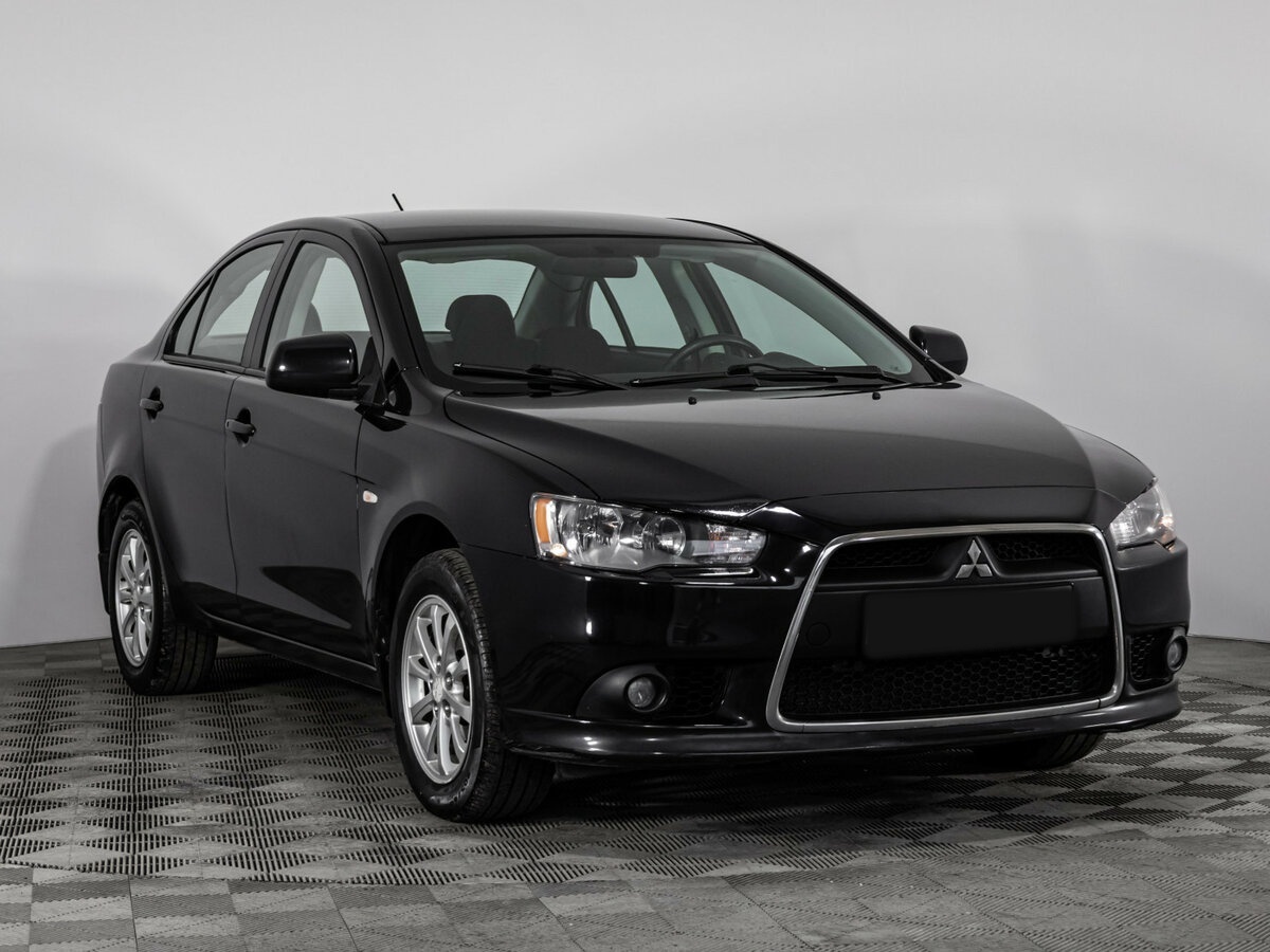 Купить Mitsubishi Lancer с пробегом. Фото: #2