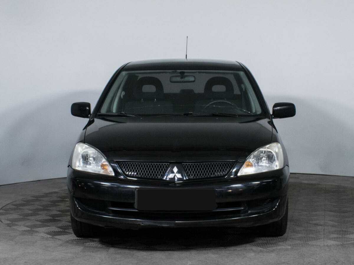 Купить Mitsubishi Lancer с пробегом. Фото: #1