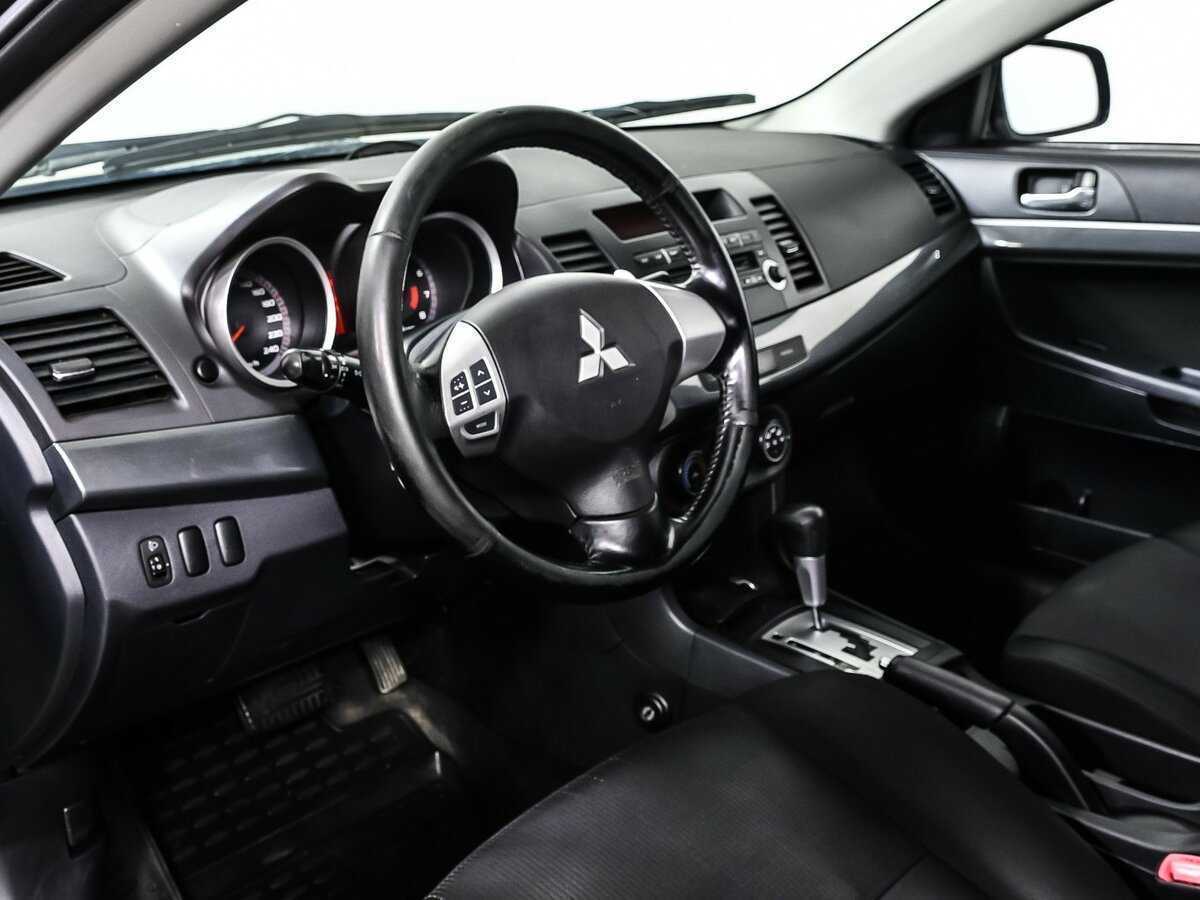 Купить Mitsubishi Lancer с пробегом. Фото: #11