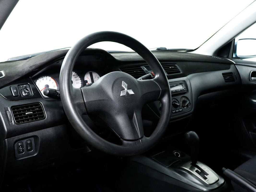 Купить Mitsubishi Lancer с пробегом. Фото: #12