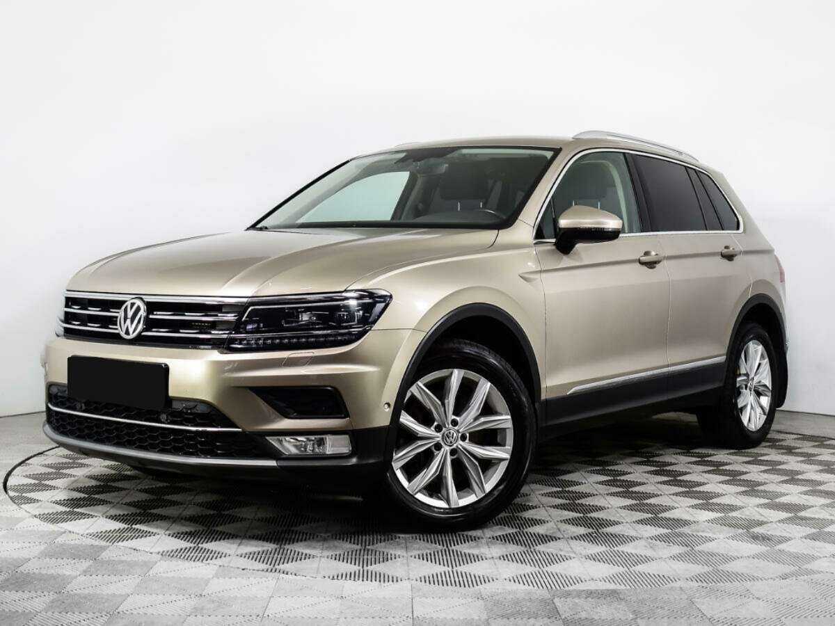 Купить Volkswagen Tiguan с пробегом. Посмотреть фото