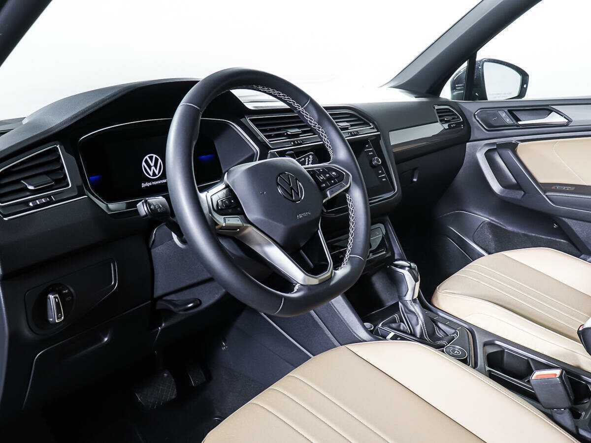 Купить Volkswagen Tiguan с пробегом. Фото: #11