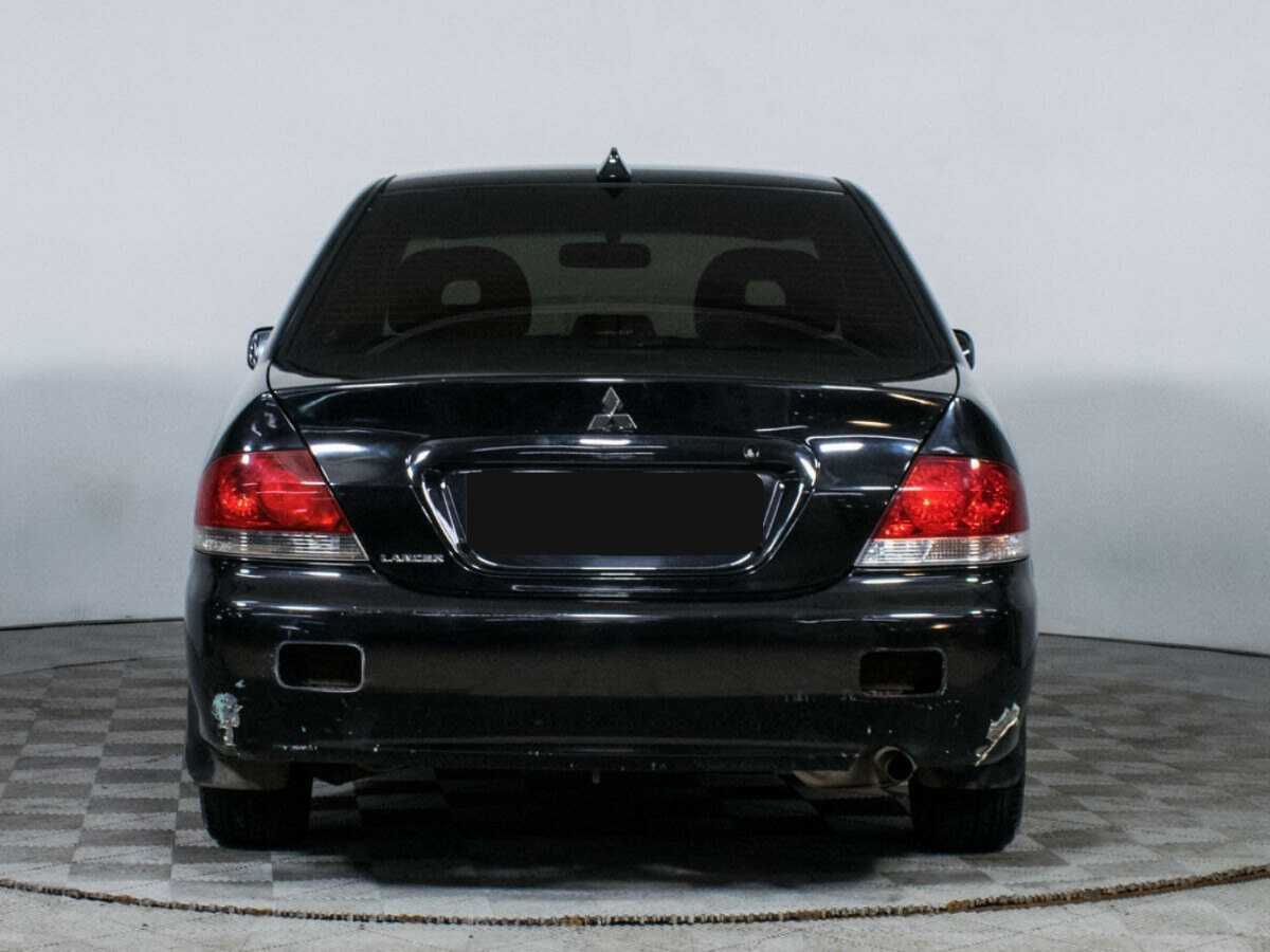 Купить Mitsubishi Lancer с пробегом. Фото: #4