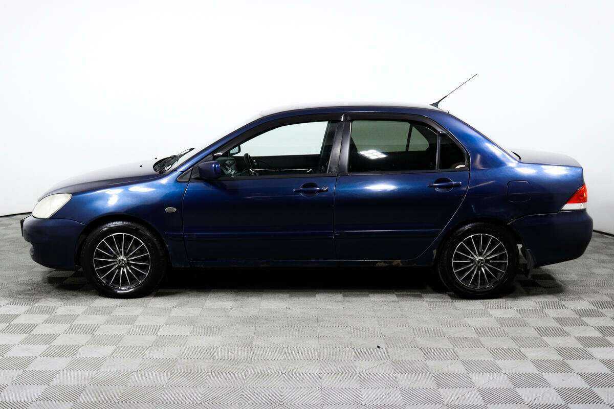 Купить Mitsubishi Lancer с пробегом. Фото: #7