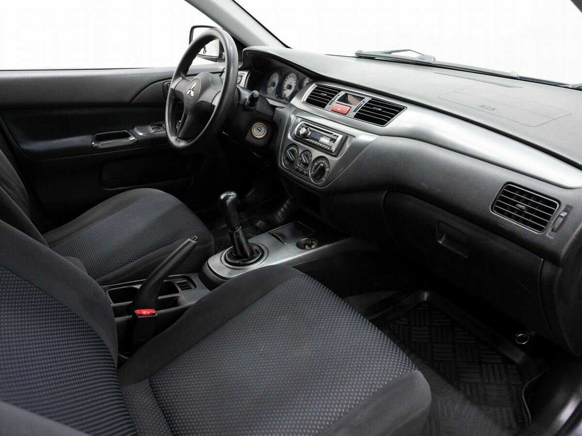 Купить Mitsubishi Lancer с пробегом. Фото: #9