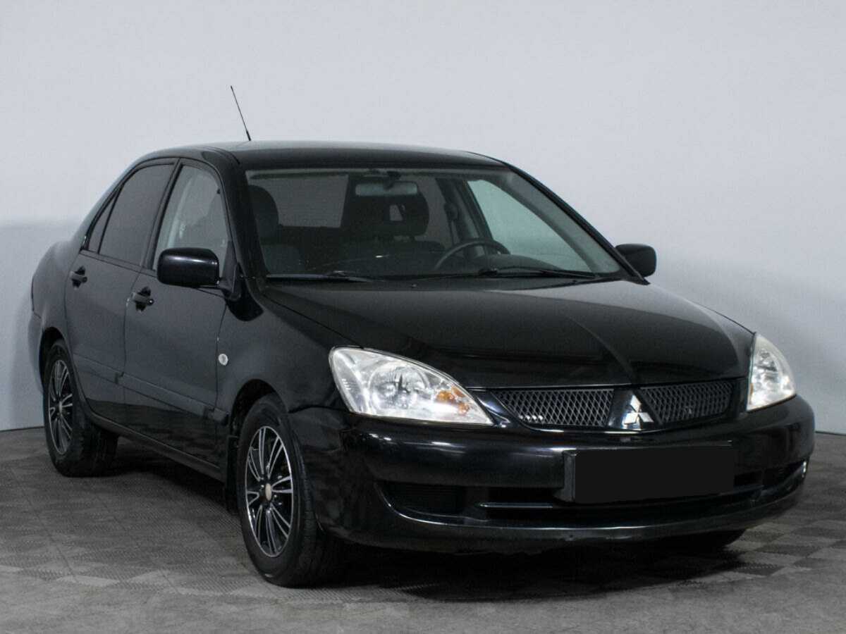 Купить Mitsubishi Lancer с пробегом. Фото: #2