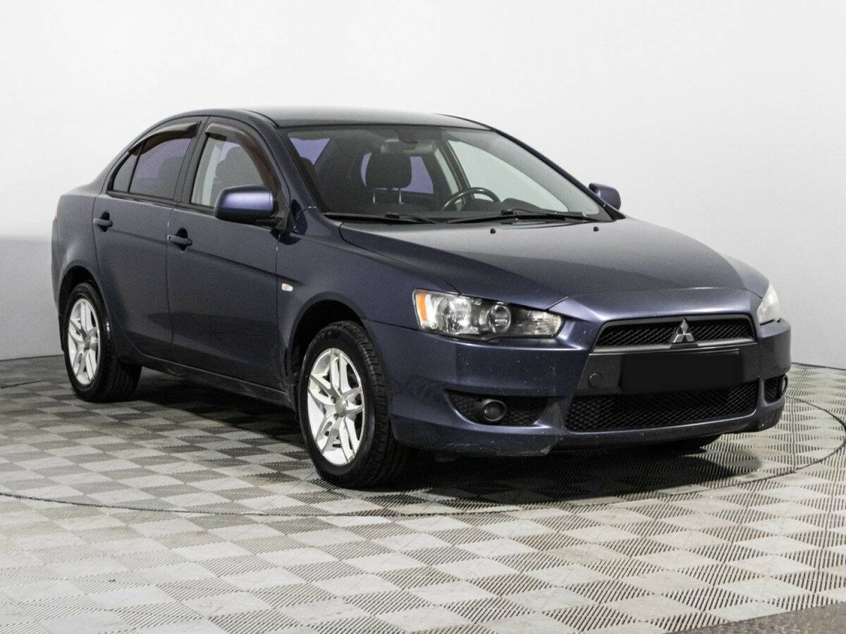 Купить Mitsubishi Lancer с пробегом. Фото: #2