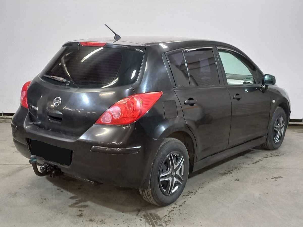 Купить Nissan Tiida с пробегом. Фото: #4