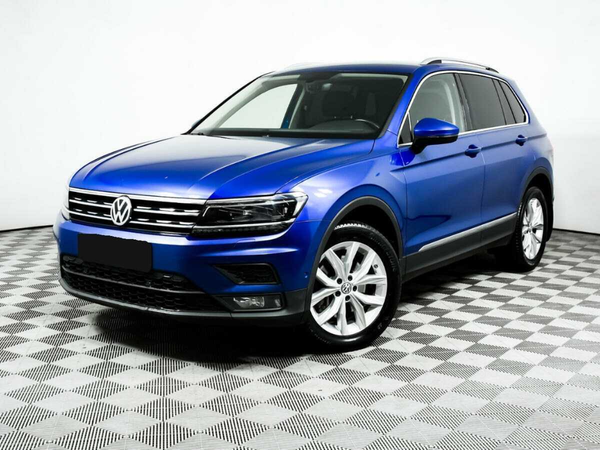 Купить Volkswagen Tiguan с пробегом. Посмотреть фото