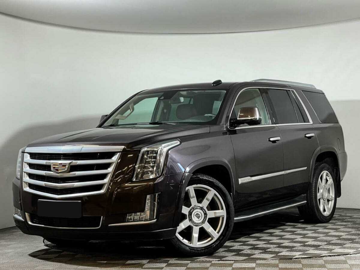 Купить Cadillac Escalade с пробегом. Посмотреть фото