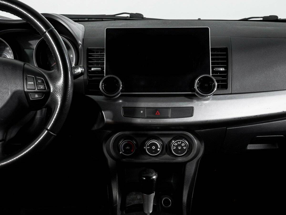 Купить Mitsubishi Lancer с пробегом. Фото: #12
