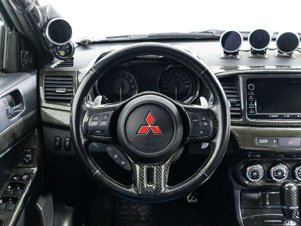Купить Mitsubishi Lancer Evolution с пробегом. Фото: #15