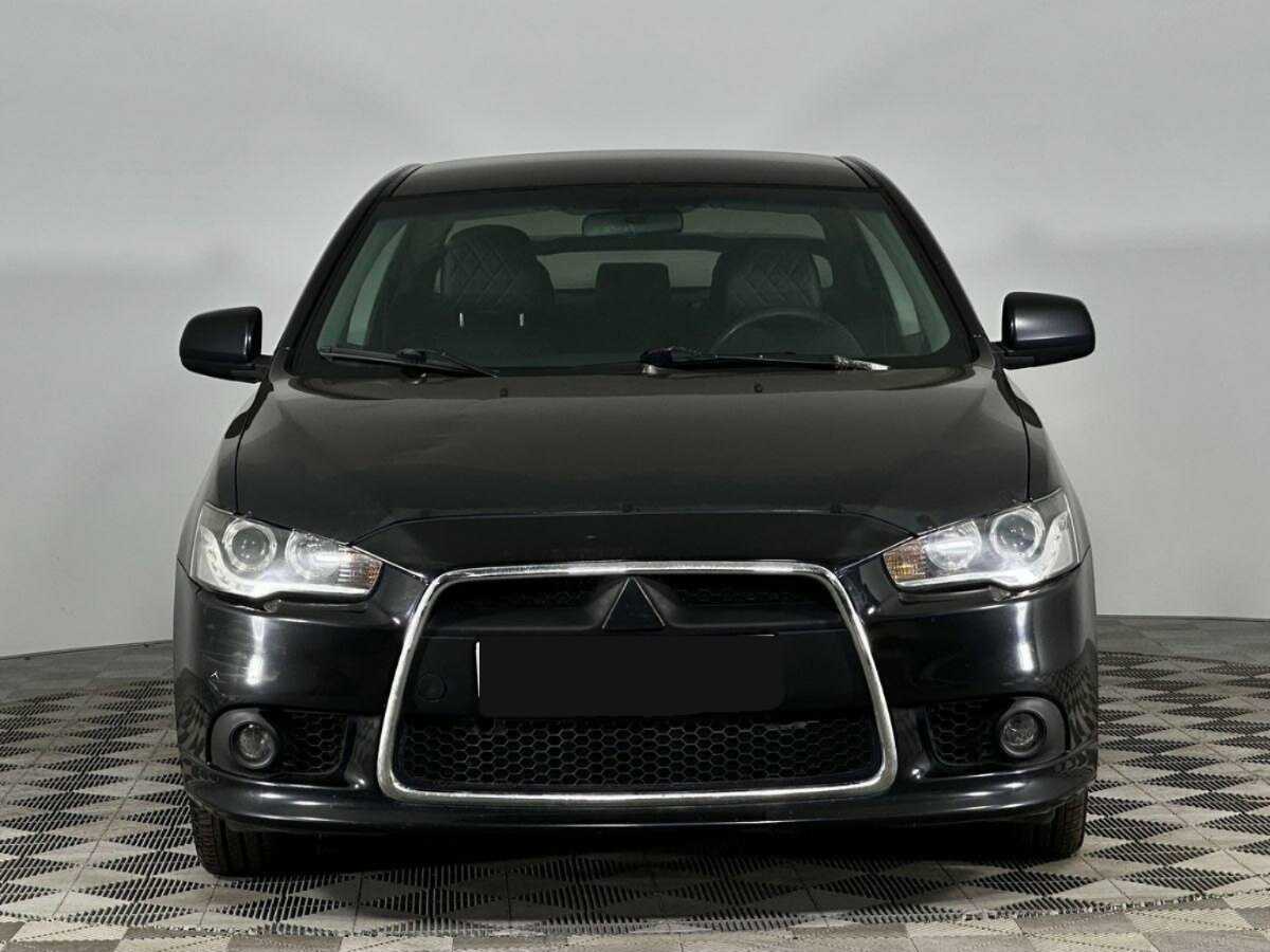 Купить Mitsubishi Lancer с пробегом. Фото: #2