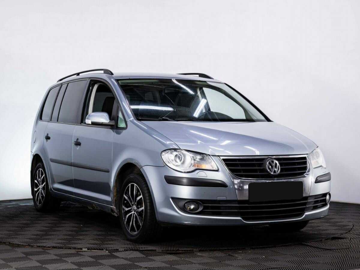 Купить Volkswagen Touran с пробегом. Фото: #2