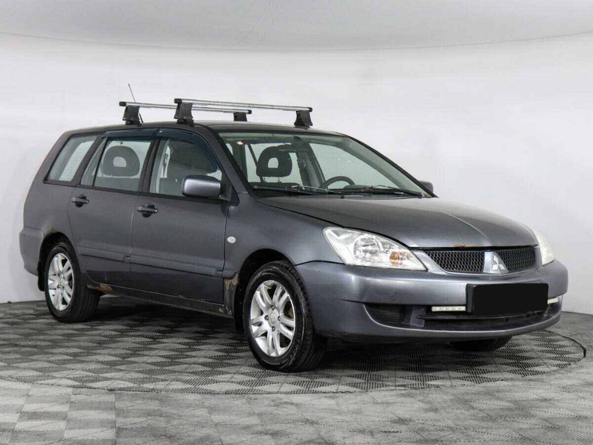 Купить Mitsubishi Lancer с пробегом. Фото: #1