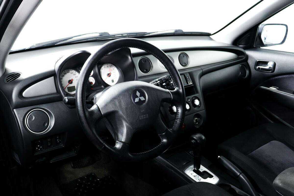 Купить Mitsubishi Outlander с пробегом. Фото: #10