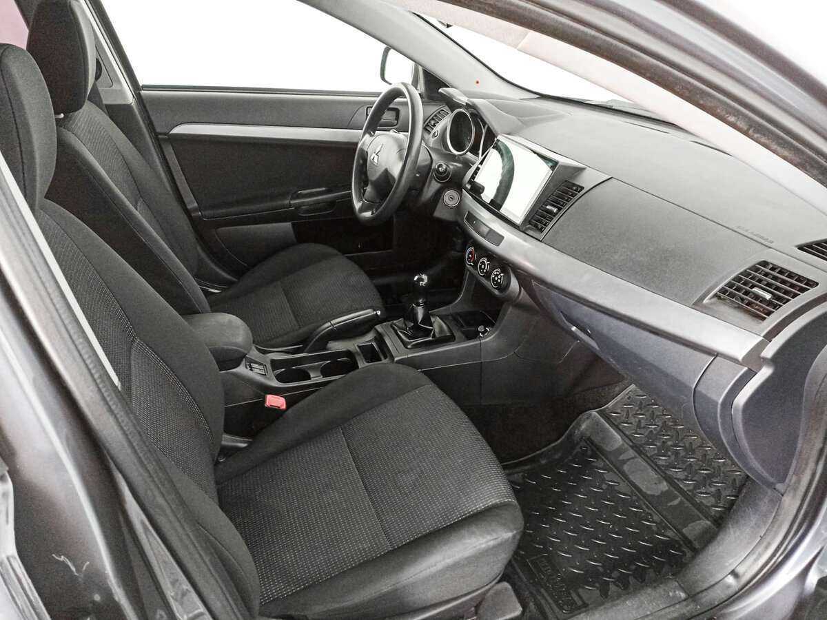 Купить Mitsubishi Lancer с пробегом. Фото: #8