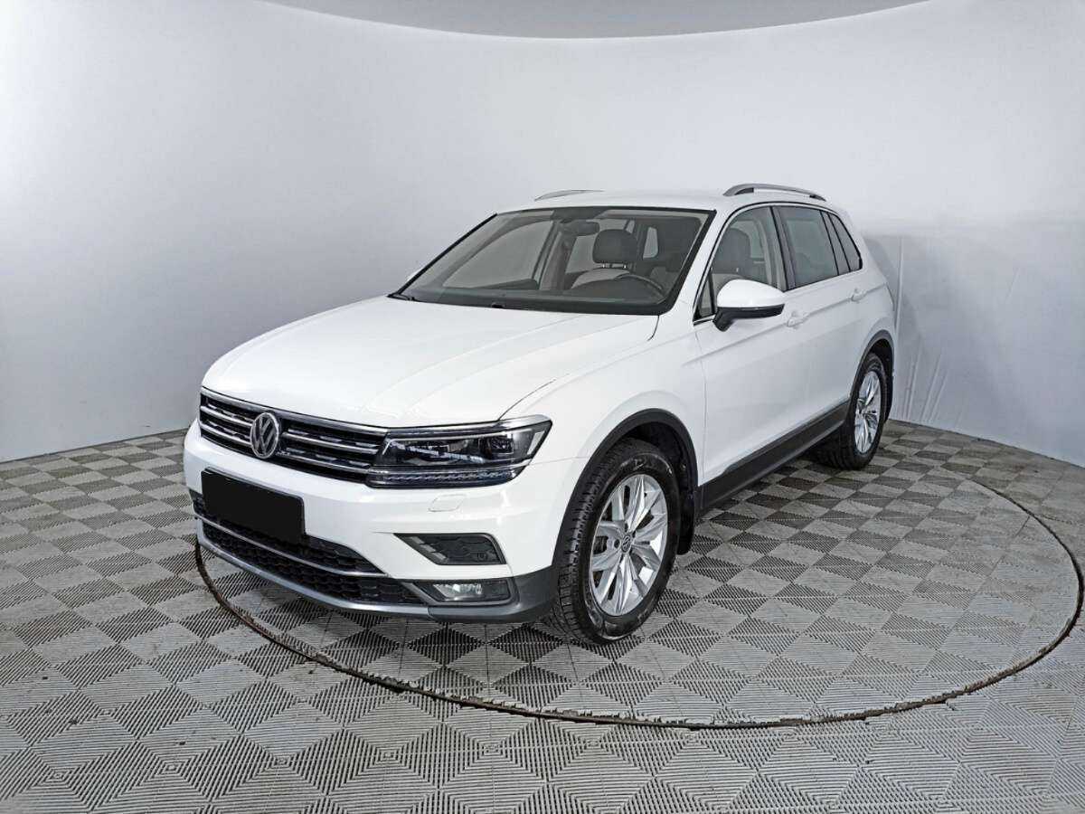 Купить Volkswagen Tiguan с пробегом. Посмотреть фото
