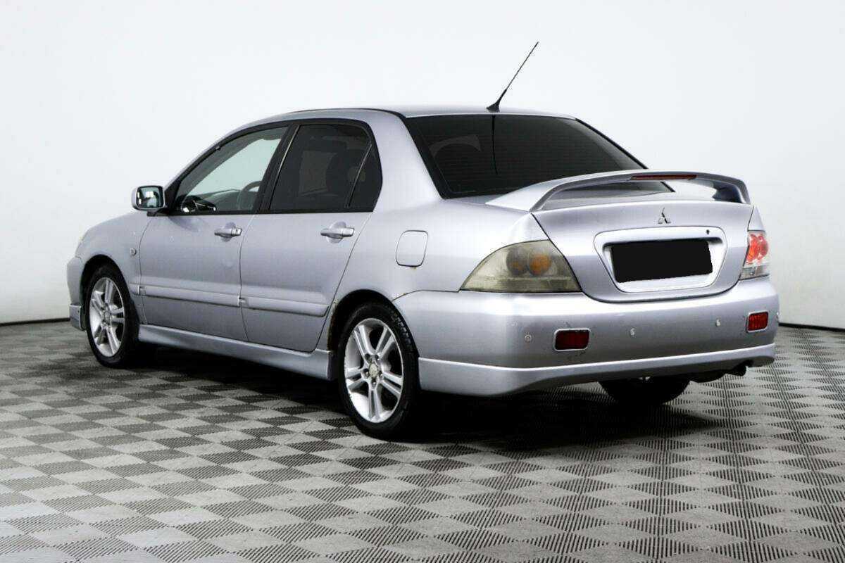 Купить Mitsubishi Lancer с пробегом. Фото: #6