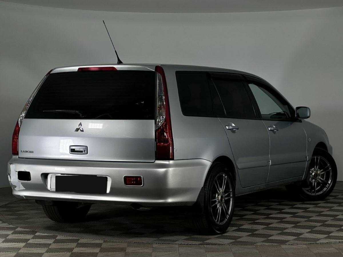 Купить Mitsubishi Lancer с пробегом. Фото: #1