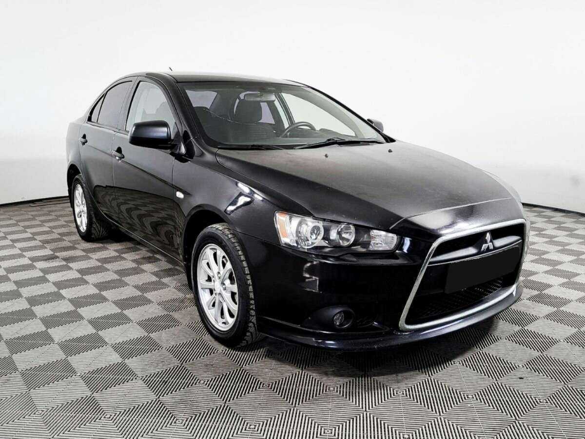 Купить Mitsubishi Lancer с пробегом. Фото: #2