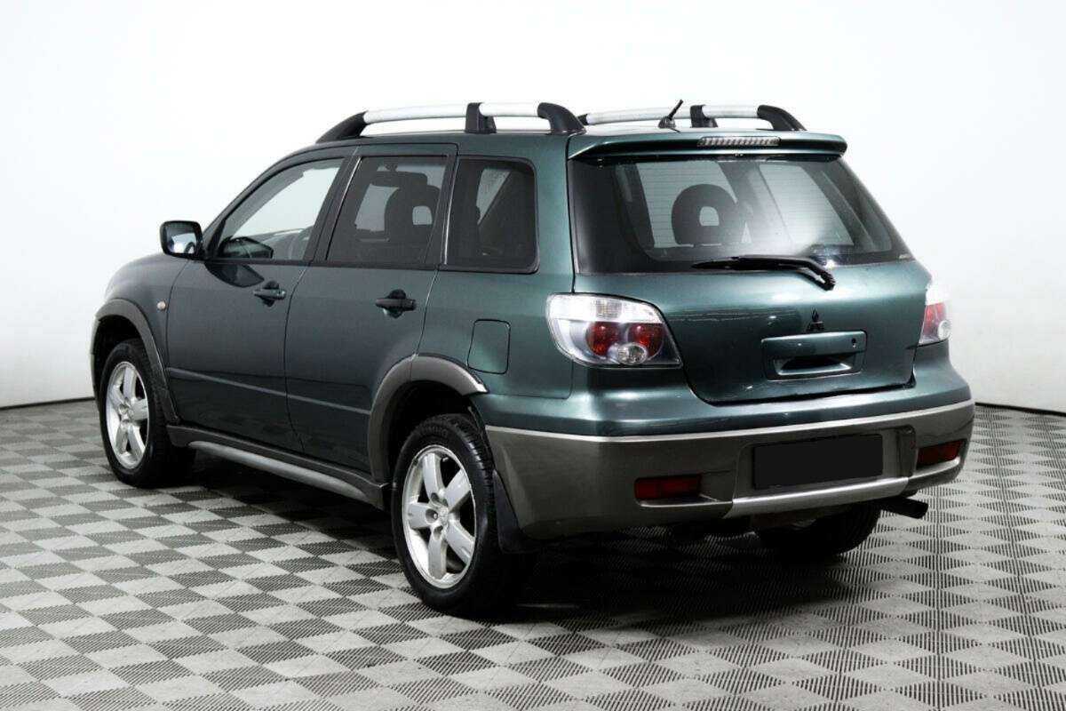 Купить Mitsubishi Outlander с пробегом. Фото: #4