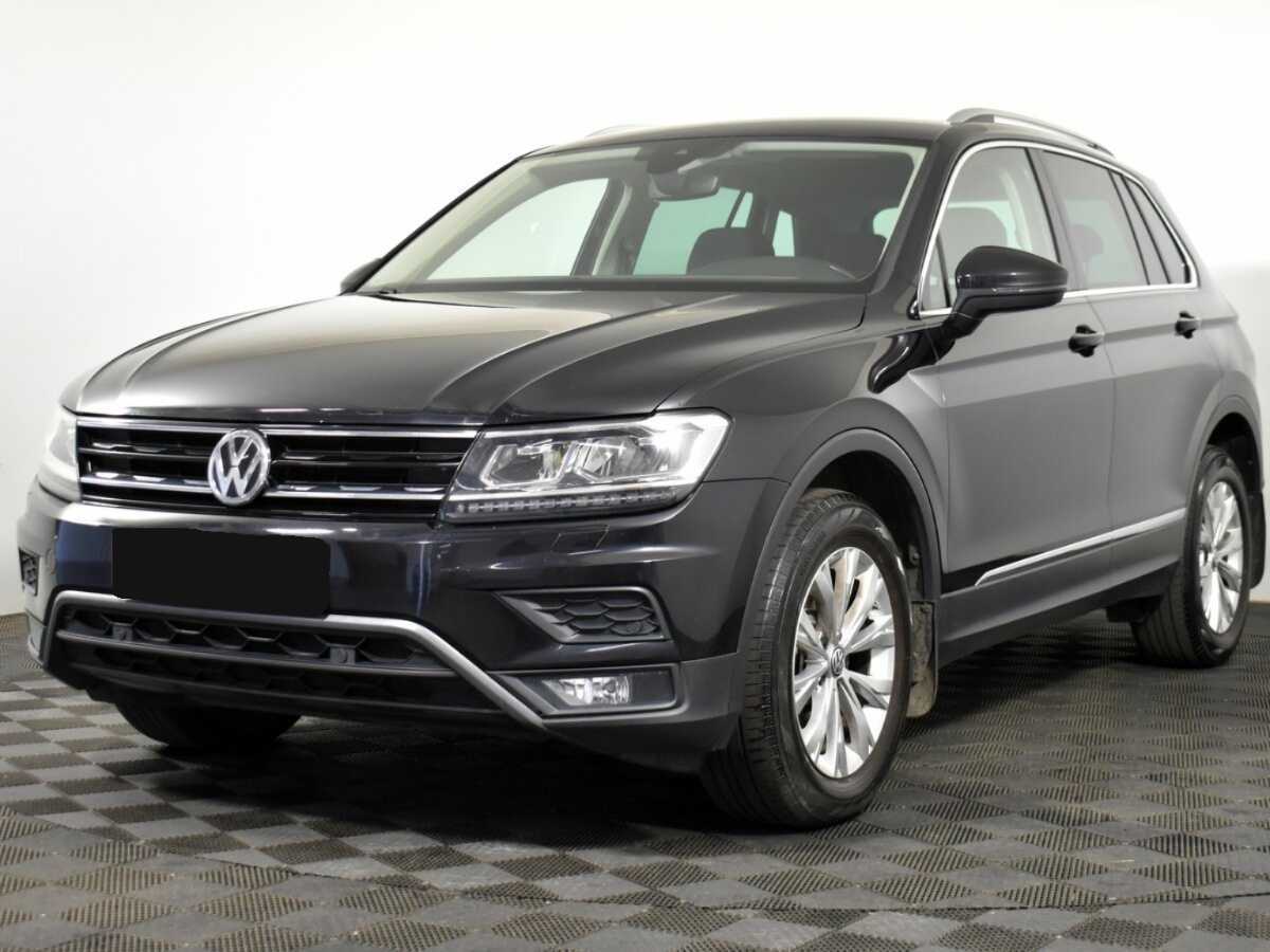 Купить Volkswagen Tiguan с пробегом. Посмотреть фото