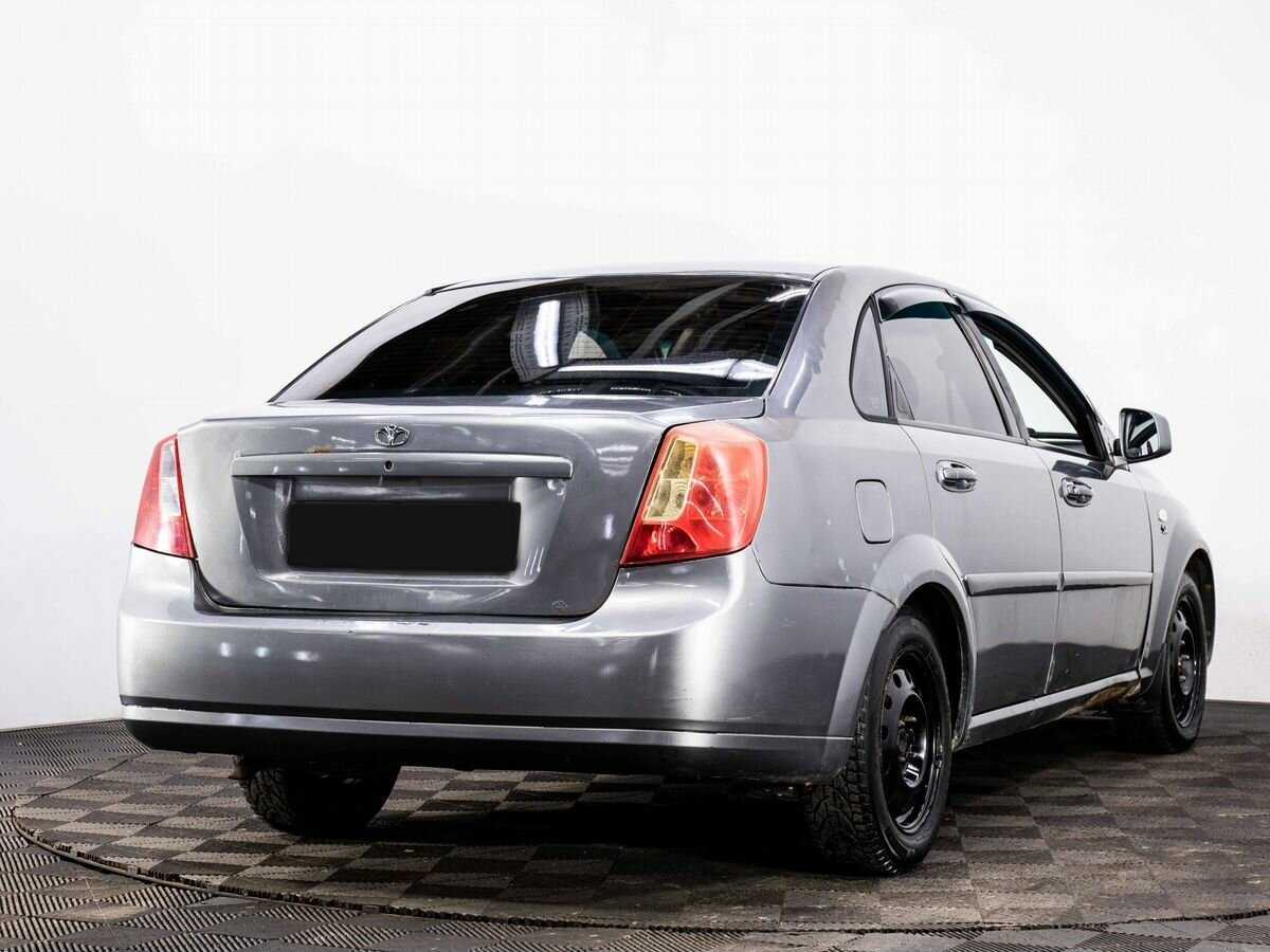 Купить Daewoo Gentra с пробегом. Фото: #5