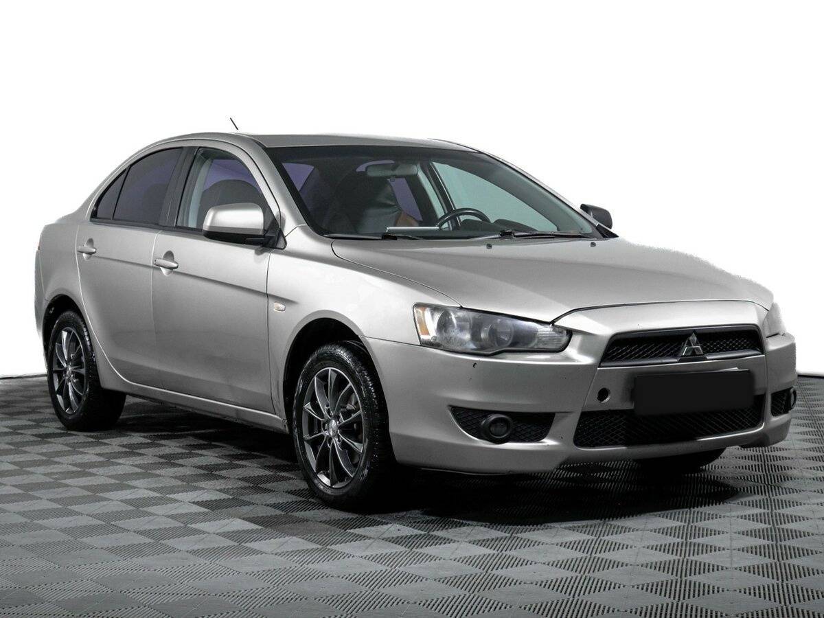 Купить Mitsubishi Lancer с пробегом. Фото: #2