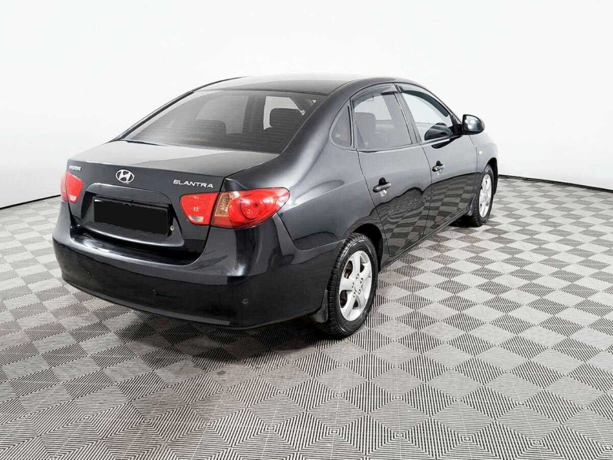 Купить Hyundai Elantra с пробегом. Фото: #4
