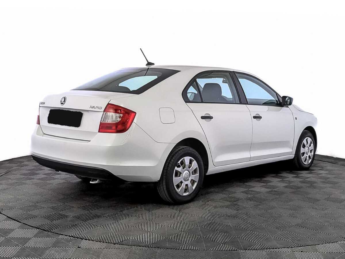 Купить Skoda Rapid с пробегом. Фото: #4