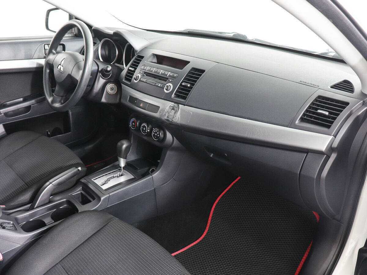 Купить Mitsubishi Lancer с пробегом. Фото: #9