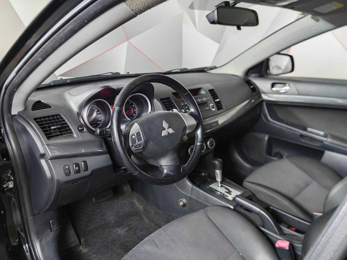 Купить Mitsubishi Lancer с пробегом. Фото: #12